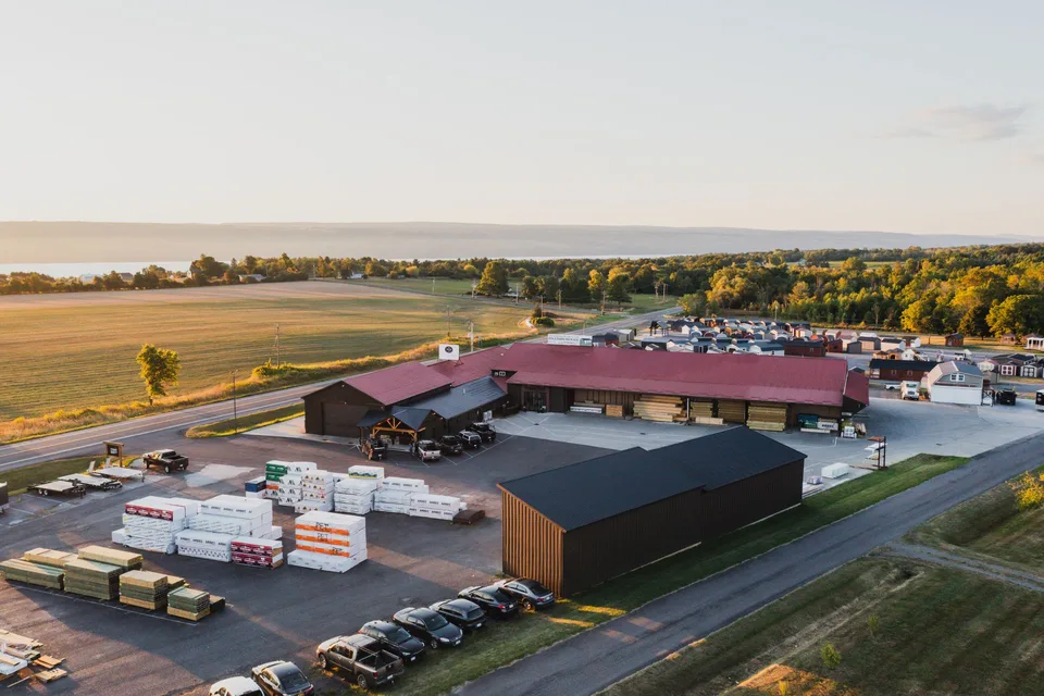 Aerial view of Tyrone Building Supply today, showing the lumber yard, buildings, and surrounding countryside