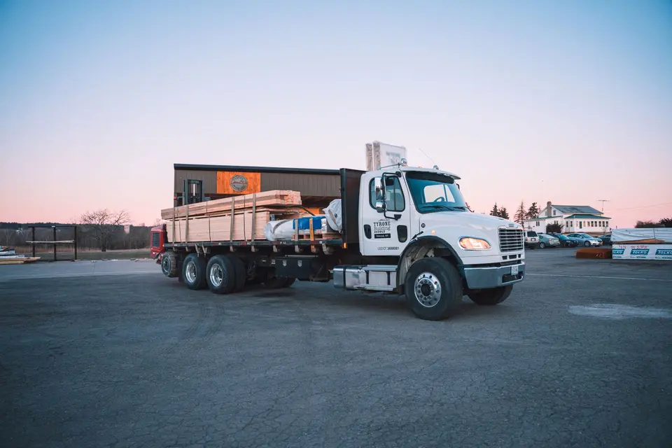 Loaded Tyrone Building Supply delivery truck ready to leave the yard